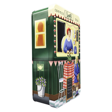 Indlæs billede til gallerivisning Kage dåse lucies cafe set fra siden, billeder af lucie som betjener en pige og blomster på siden