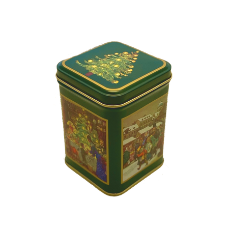 Grøn te dåse med julemotiver som juletræer og julelandskab