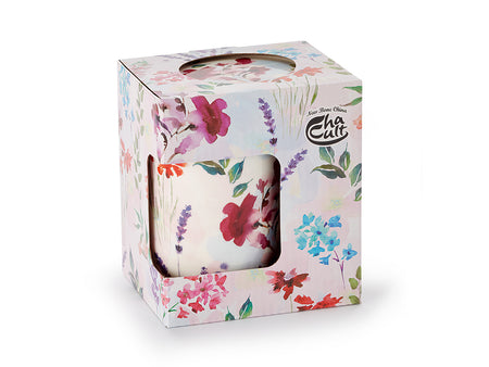 Tekop i kasse med blomster motiver