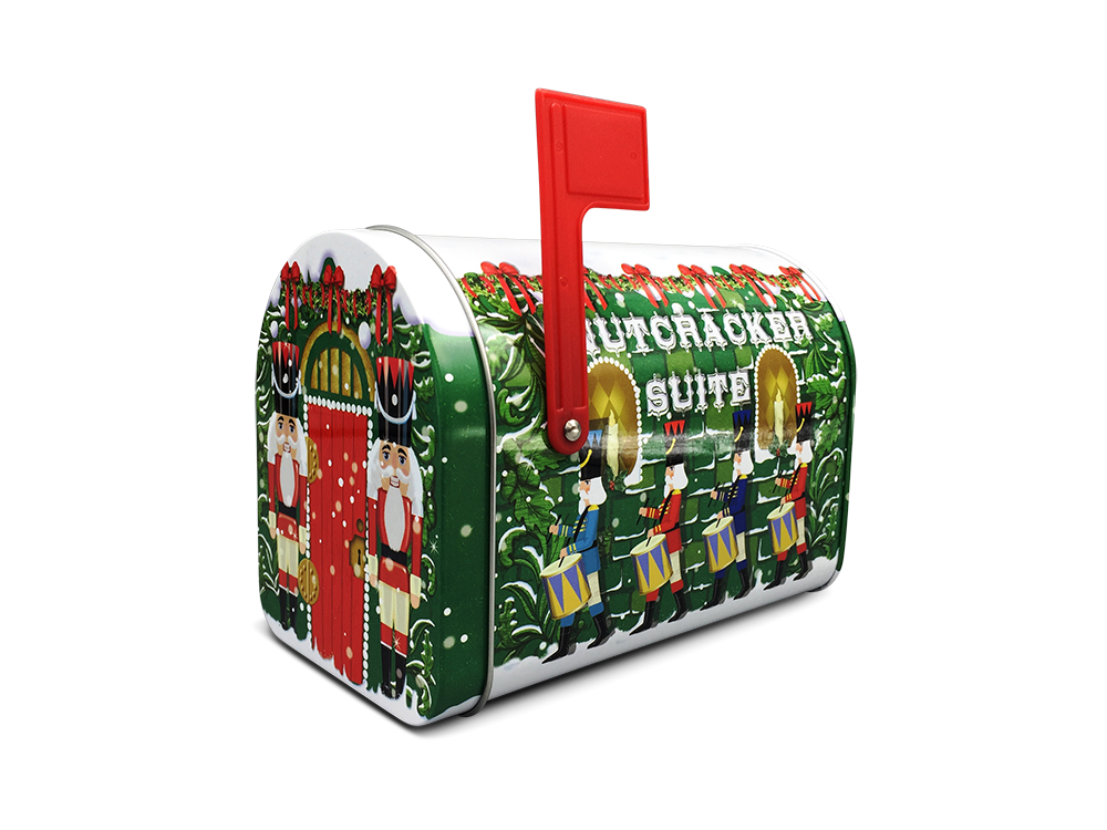 Grøn jule kagedåse formet som en postkasse med justerbart postflag og dekoreret med nøddeknækkere