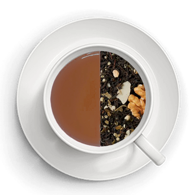 Tekop hvor man kan se den sorte te i en side og teens ingredienser i den anden